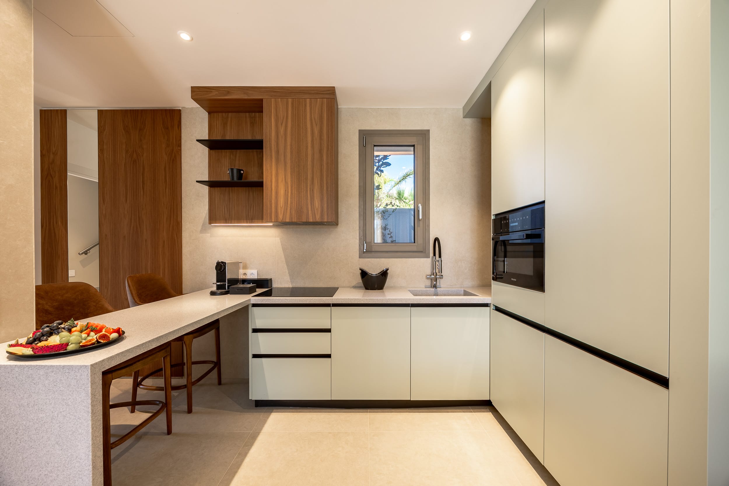 a kitchen with white cabinets