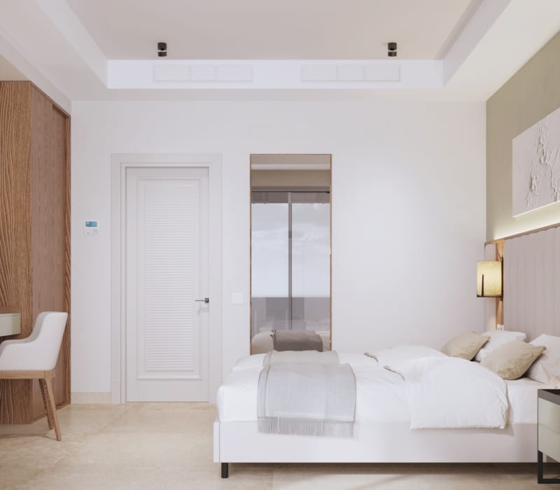 a room with a bed and a chair