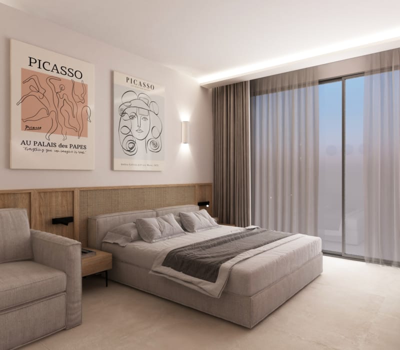 a bedroom with a bed and a couch