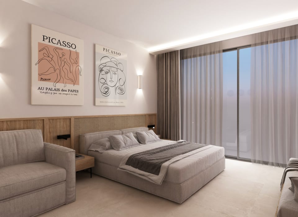 a bedroom with a bed and a couch