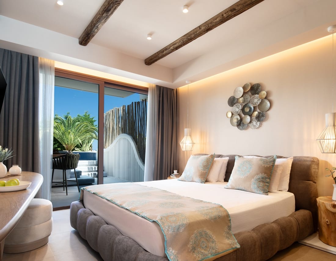 a bedroom with a large window