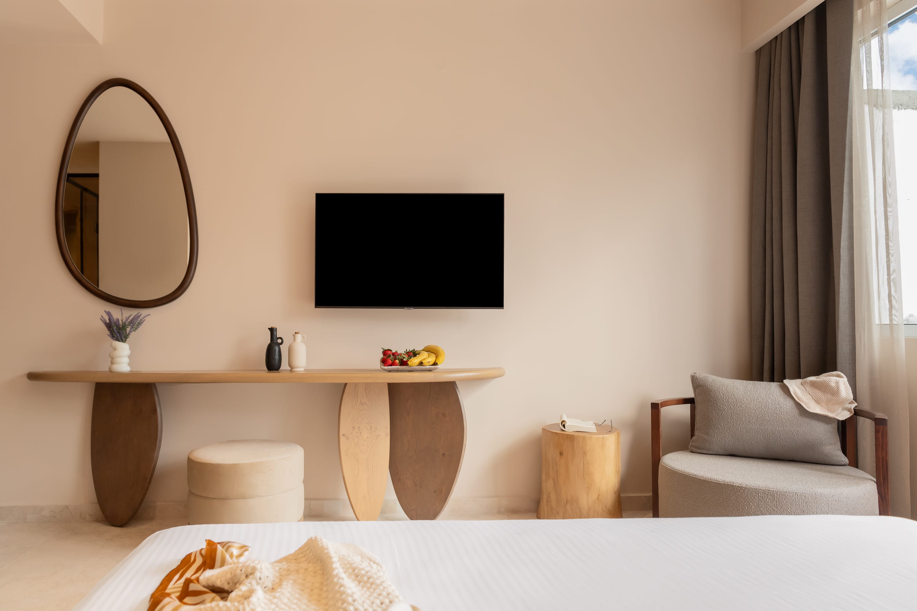 a room with a tv and a table