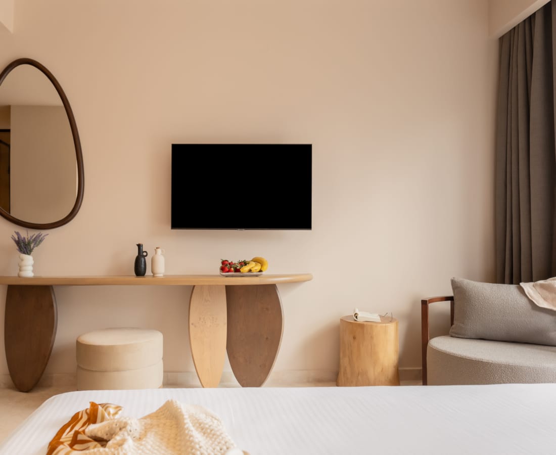 a room with a tv and a table