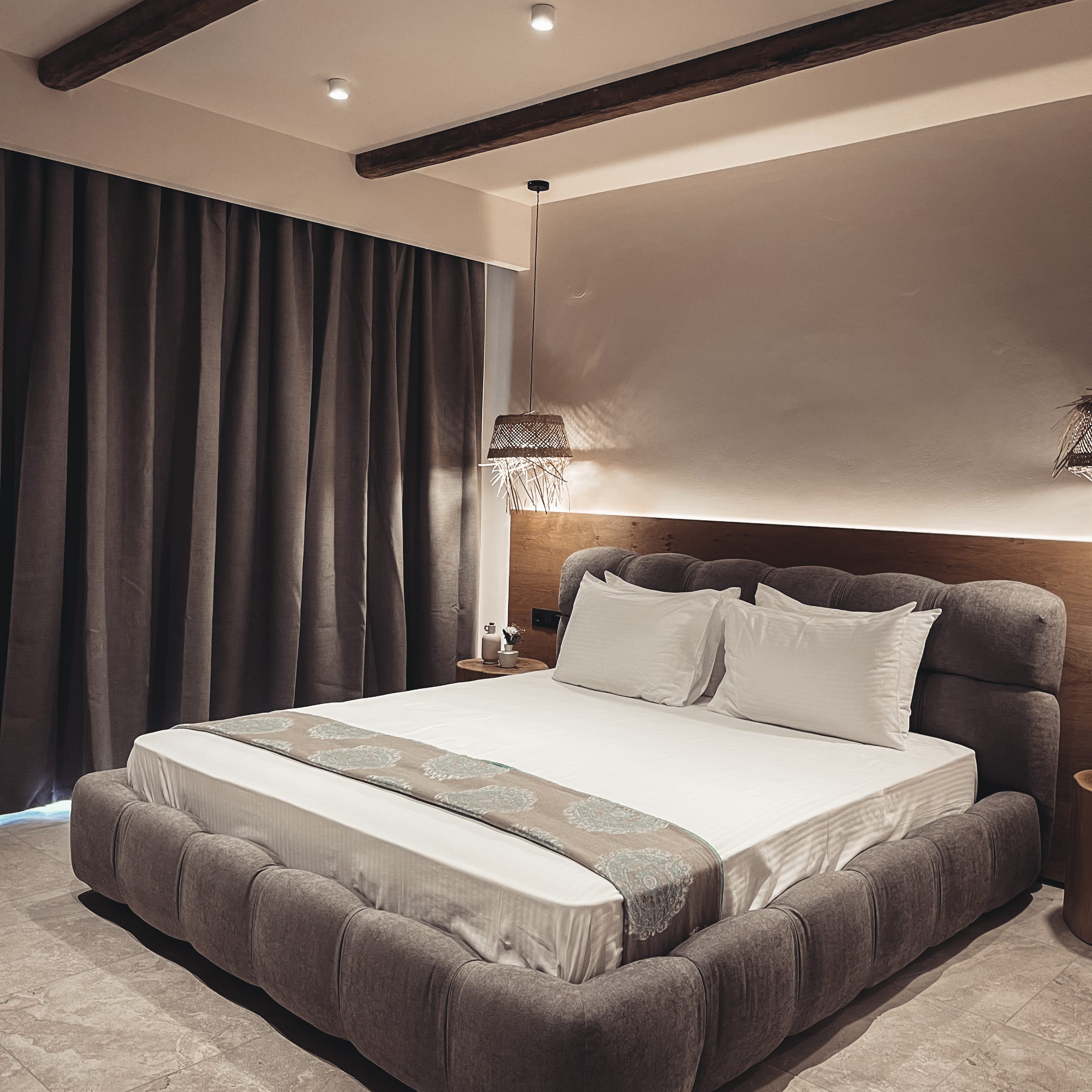 a bedroom with a large window