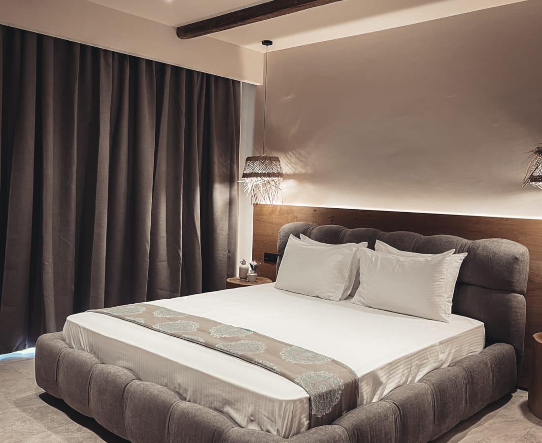 a bedroom with a large window