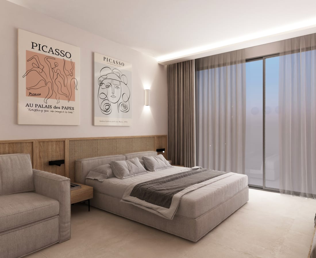 a bedroom with a bed and a couch