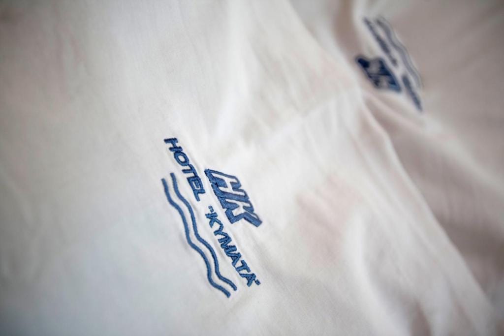 a close-up of a hand holding a pen