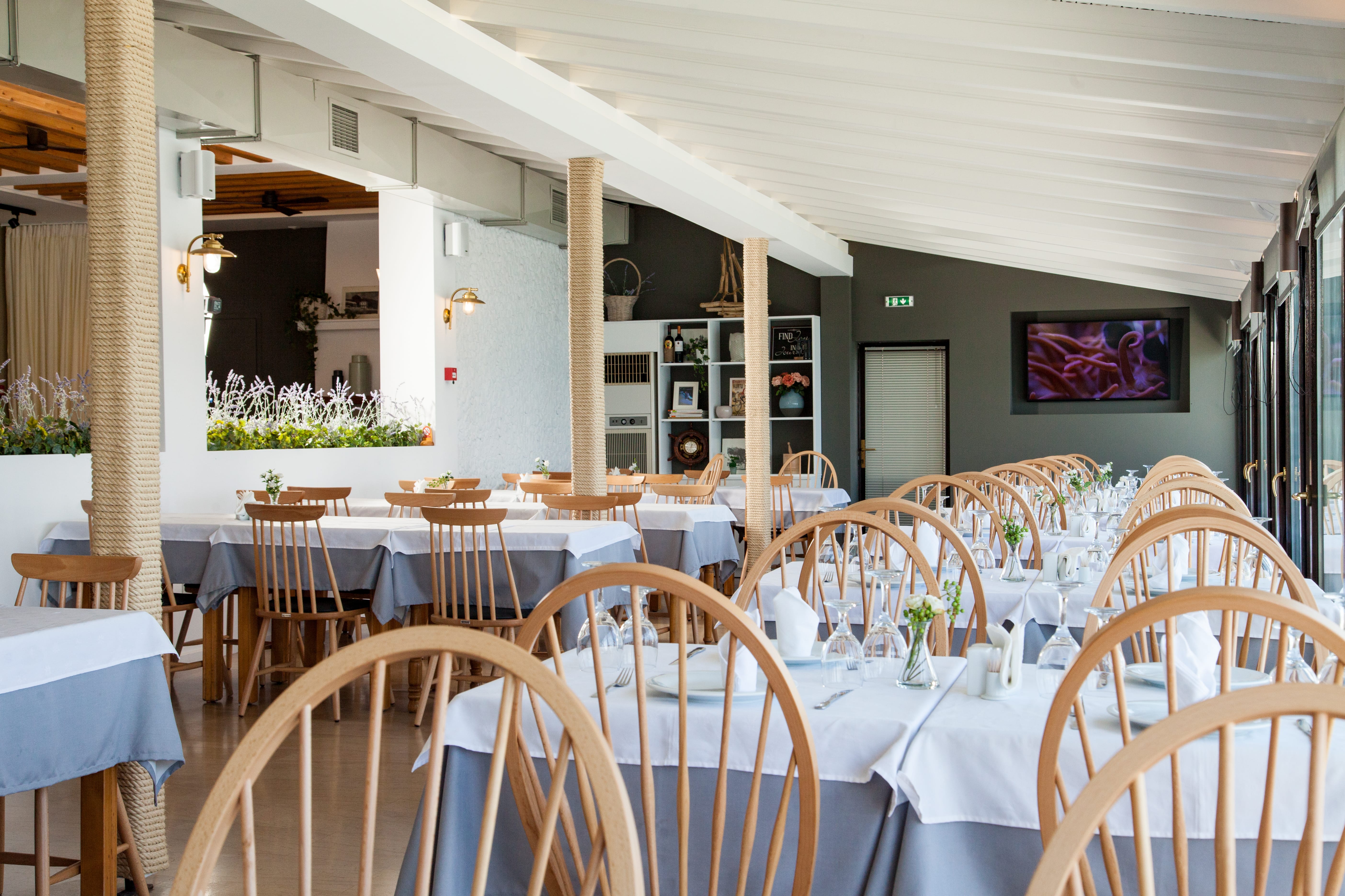 a room with tables and chairs