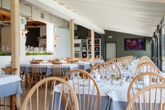 a room with tables and chairs