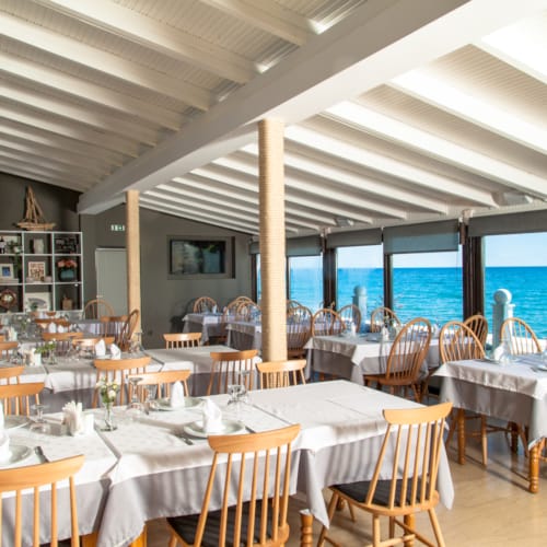 a room with tables and chairs