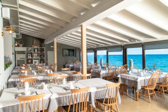 a room with tables and chairs