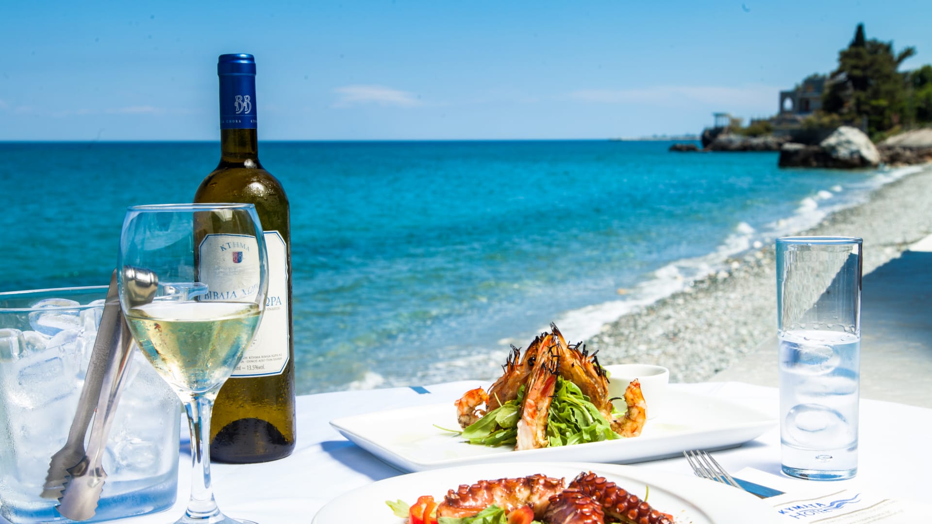 a table with food and wine
