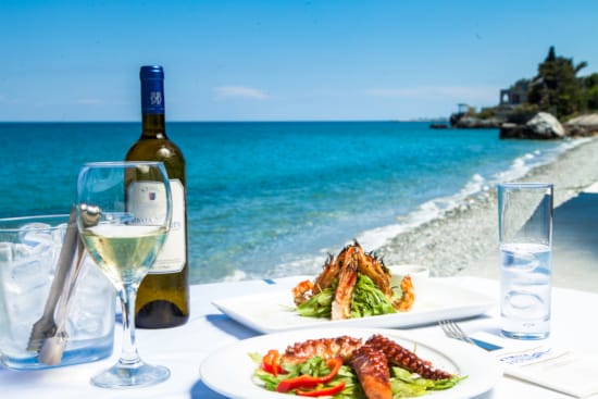 a table with food and wine