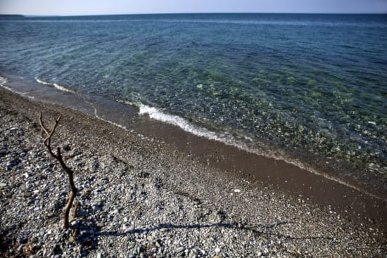 a beach with waves crashing