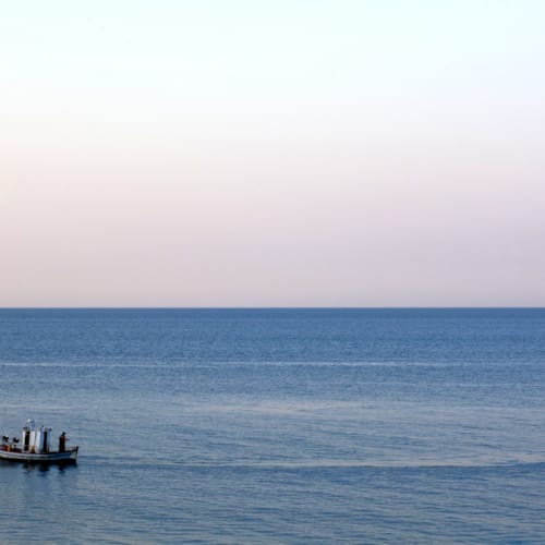 a boat sailing on the sea