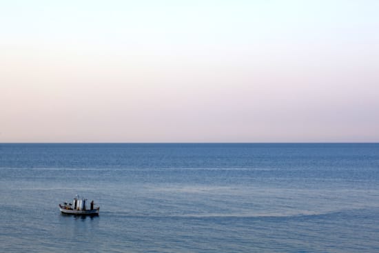 a boat sailing on the sea