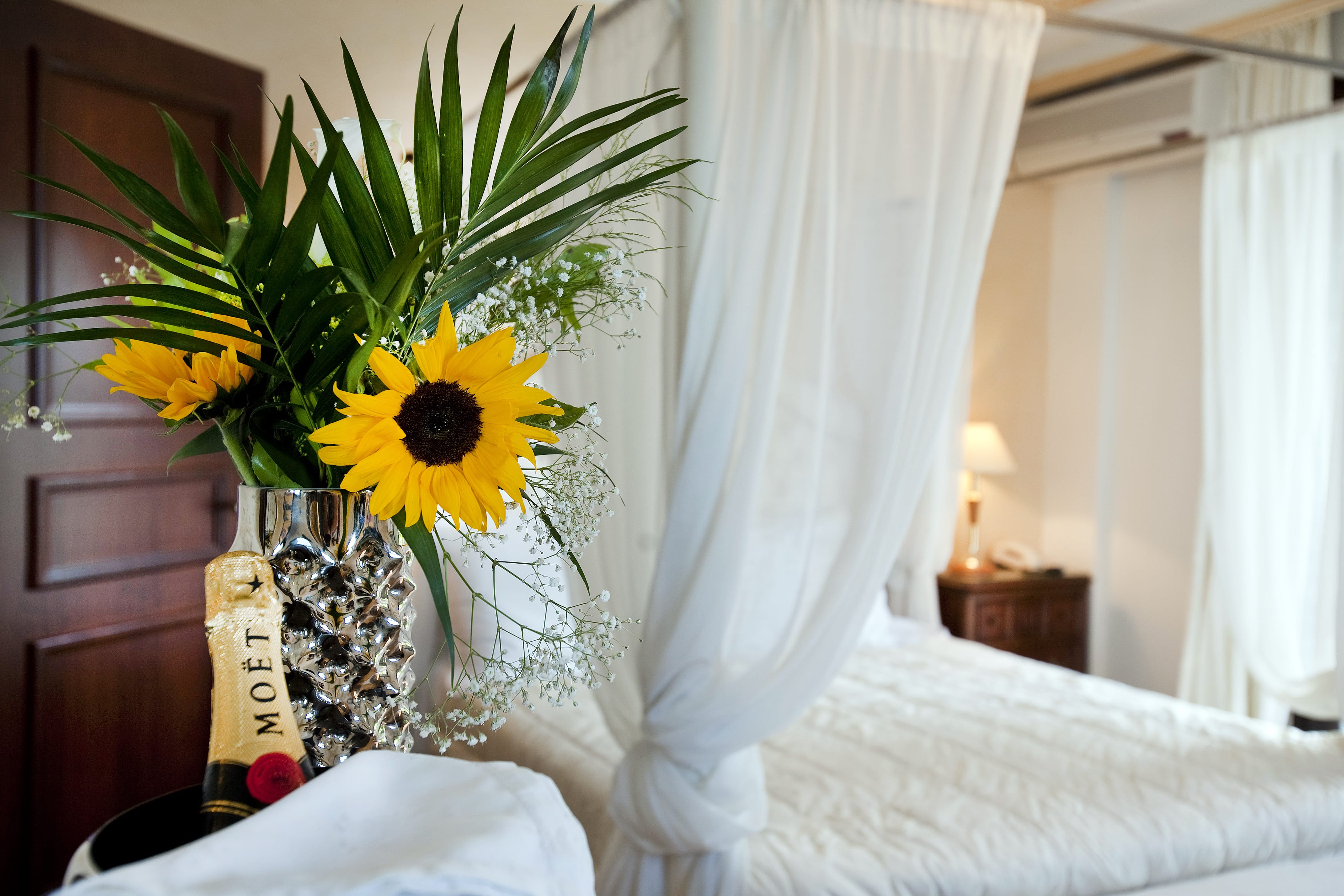 a vase with yellow flowers