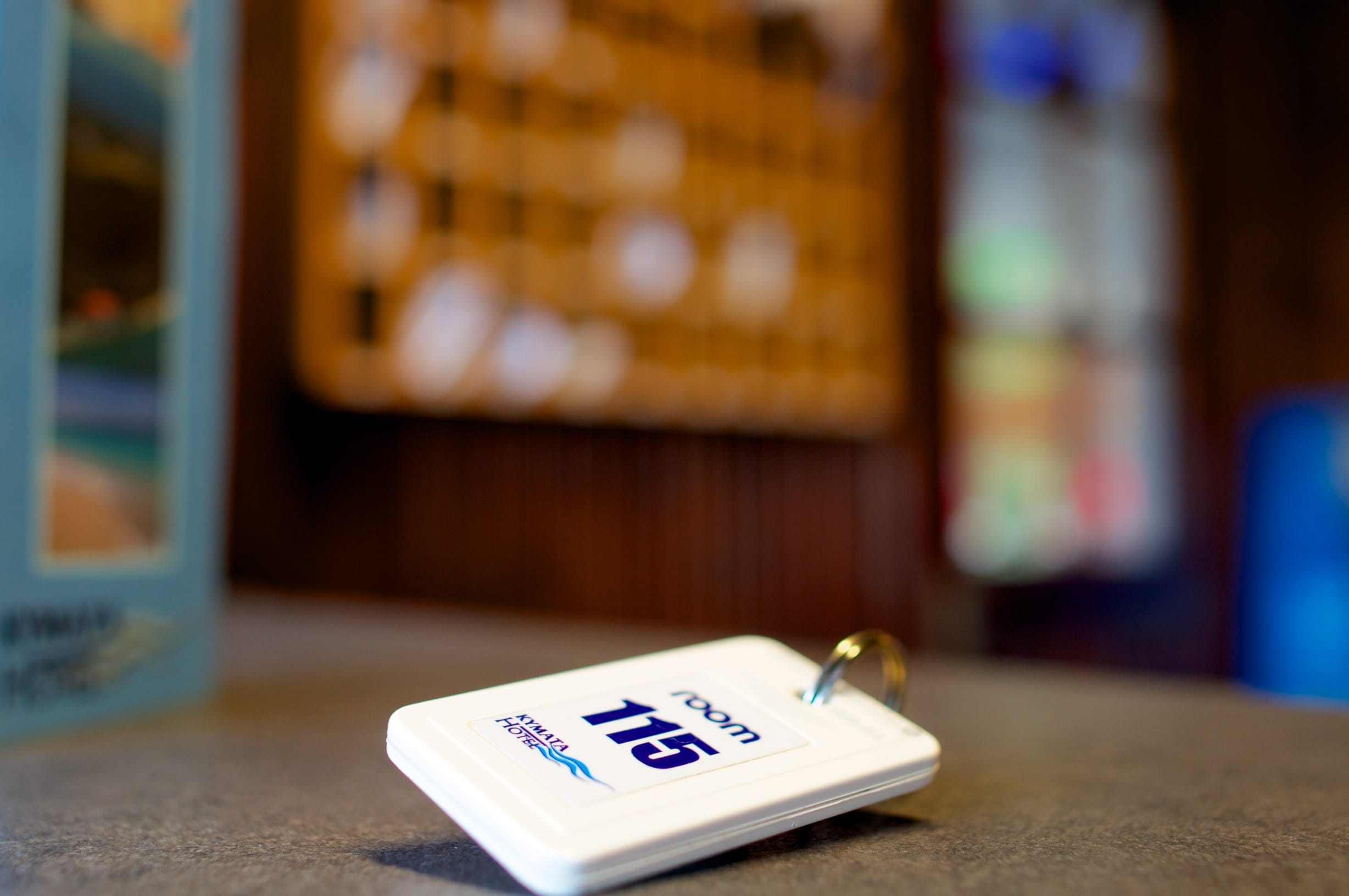 a small gold ring on a white box