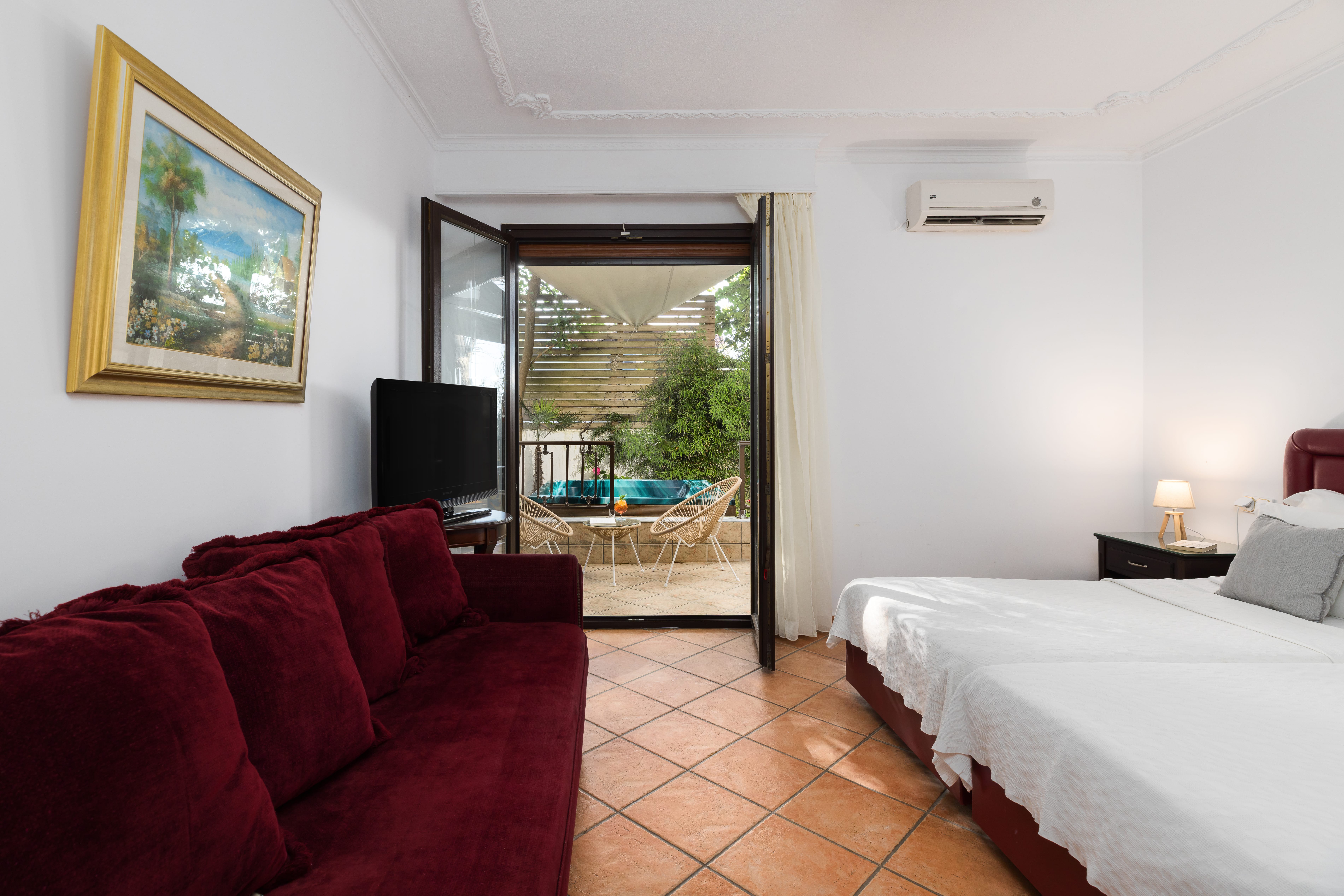 a bedroom with a large window