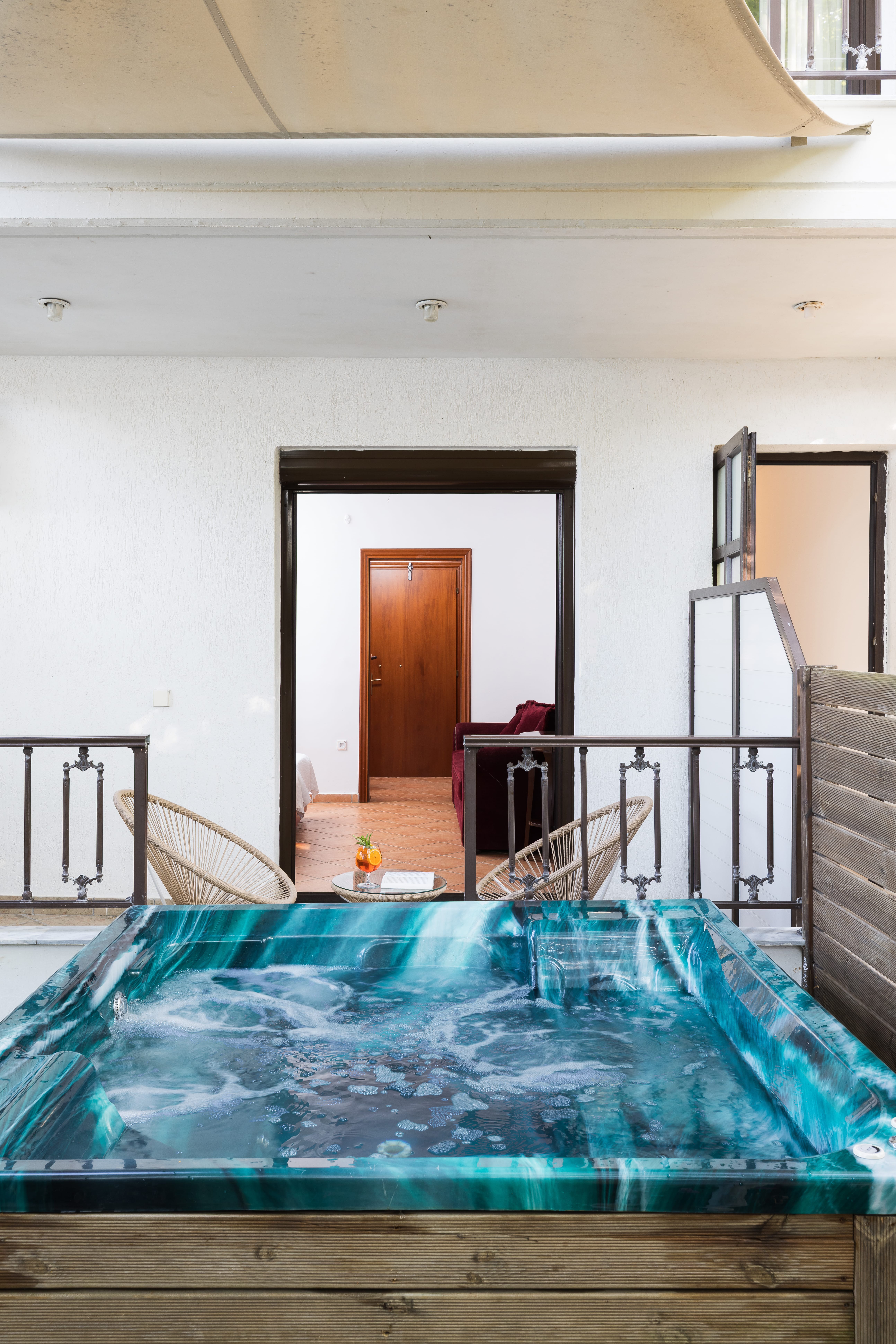 a room with a pool table and a door