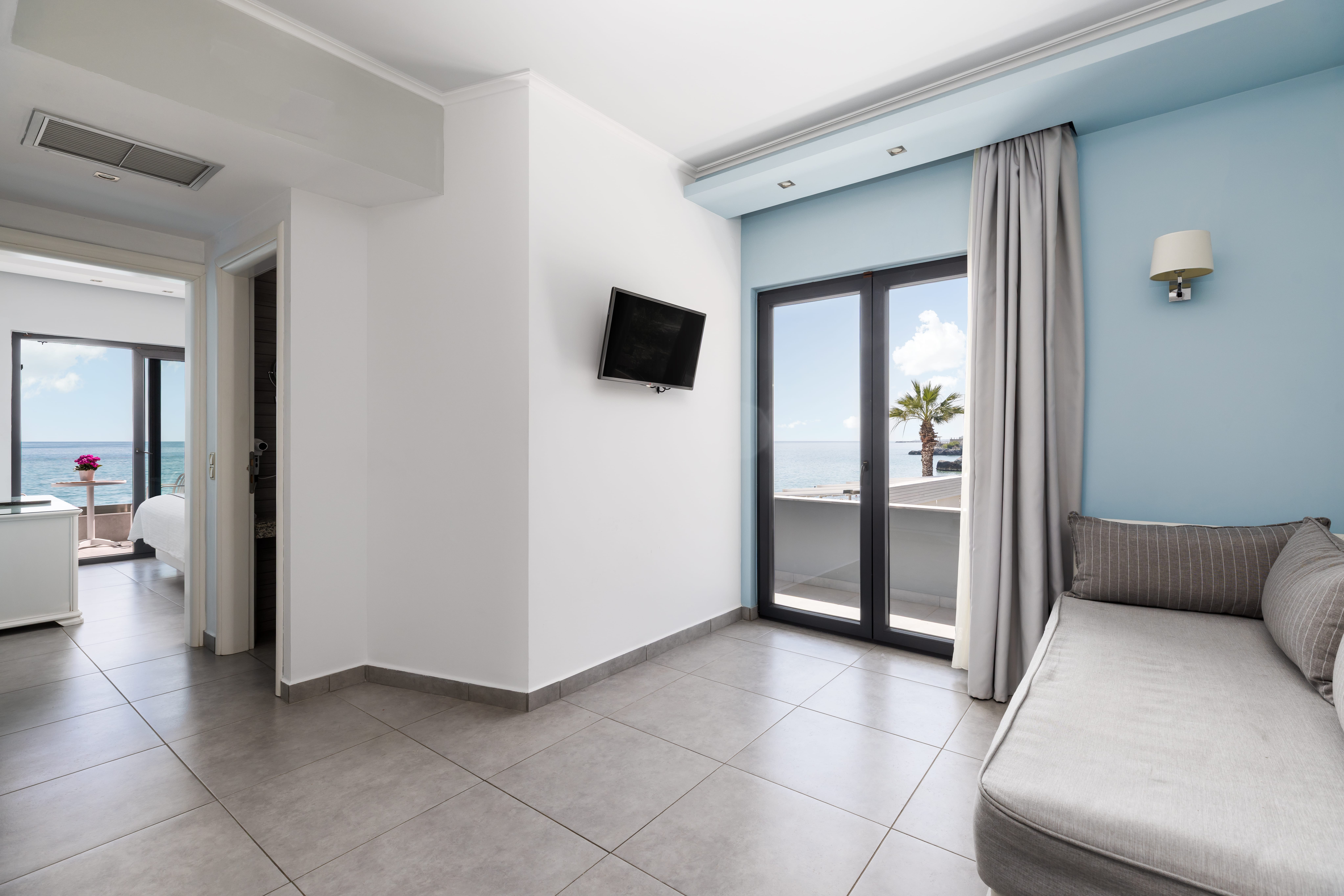 a room with a couch and a tv