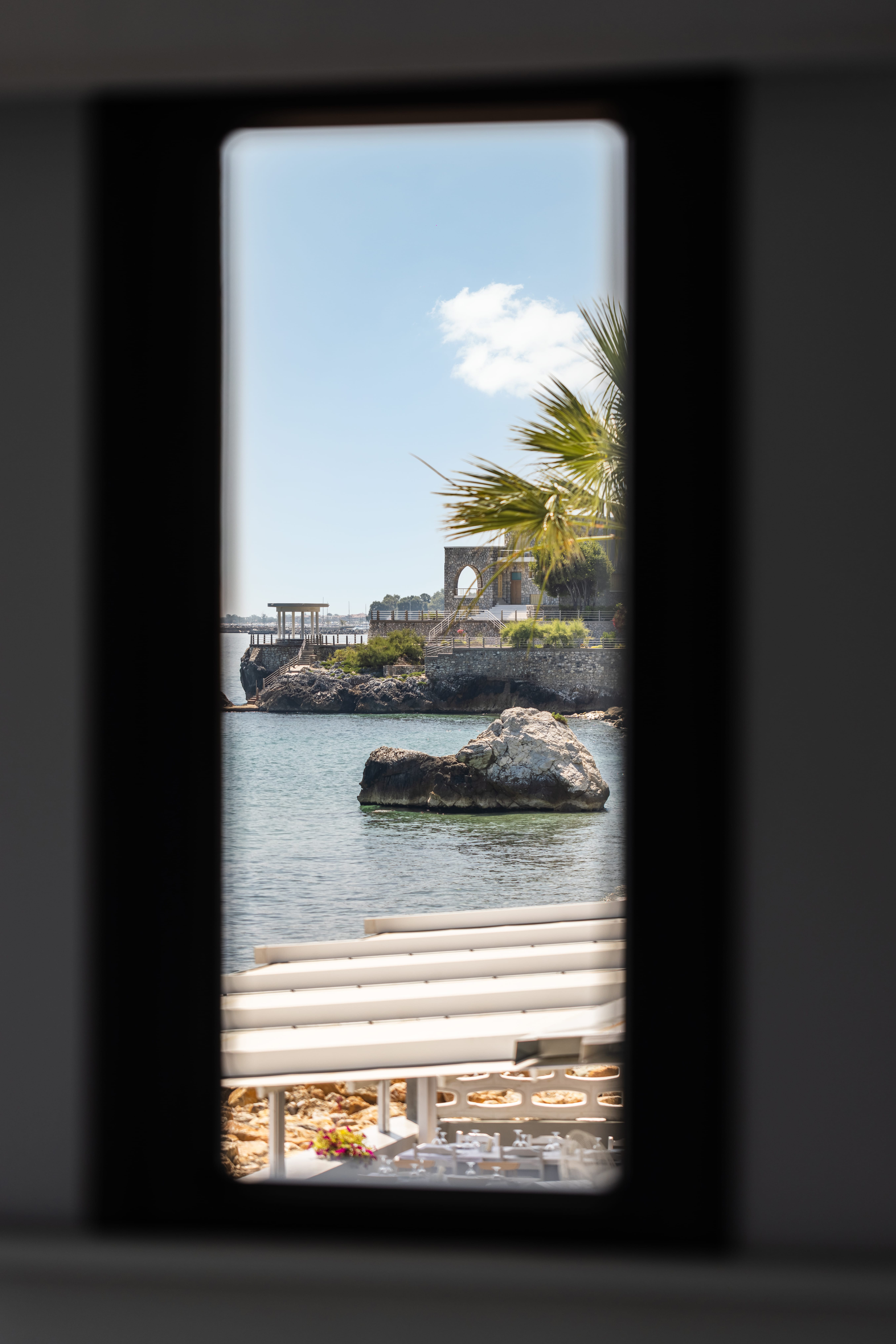 a view of the ocean from a window