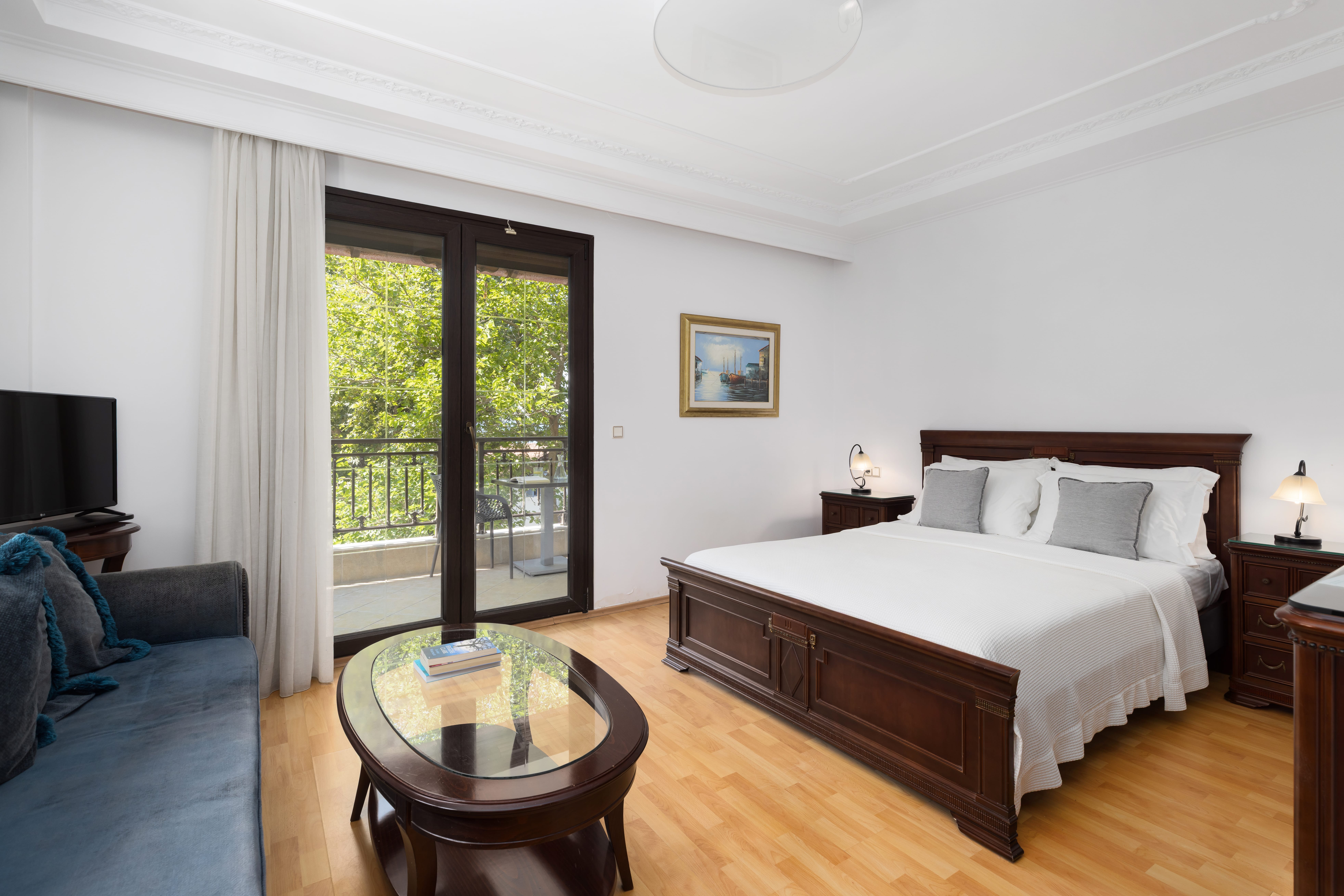 a bedroom with a large glass door