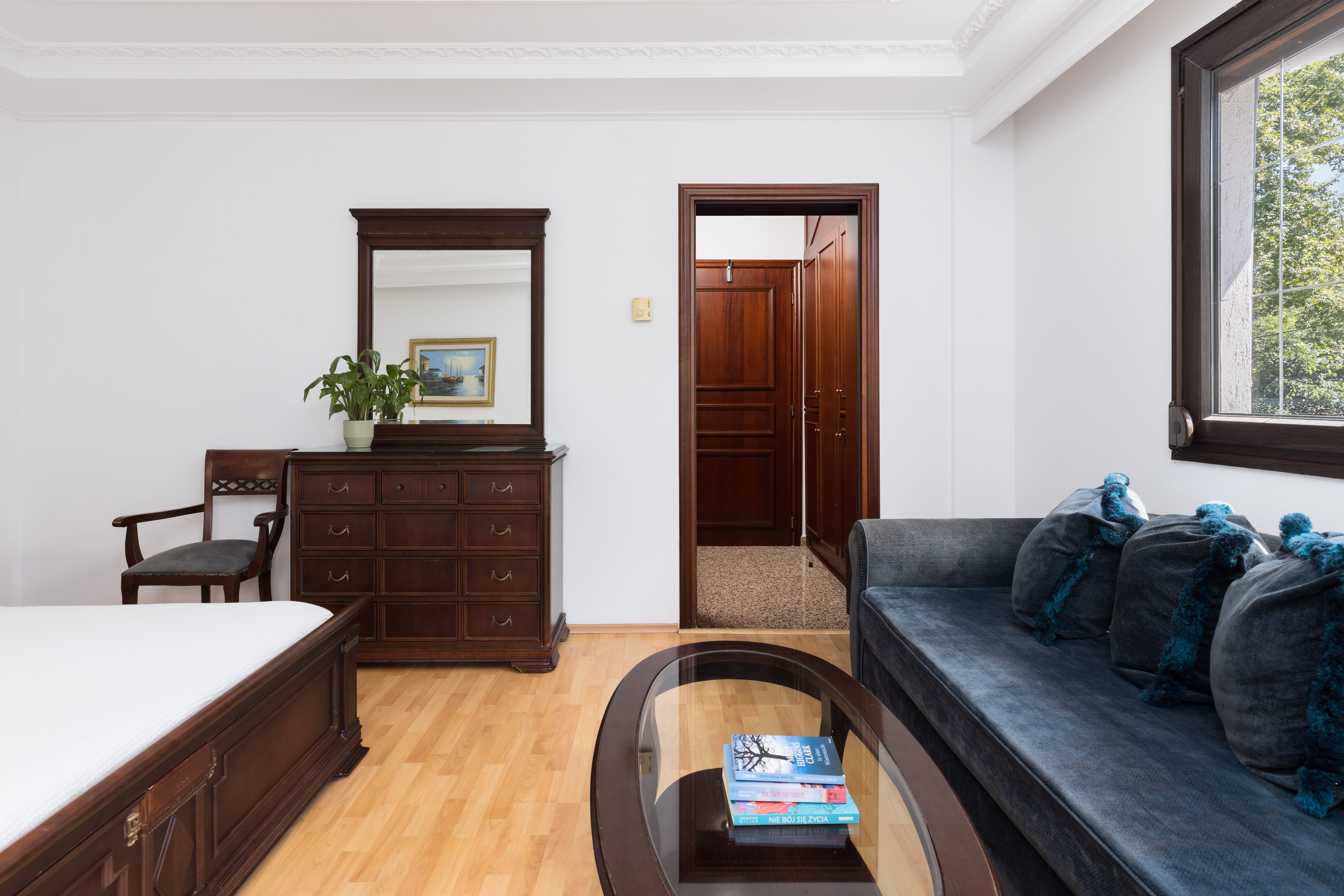 a living room with a couch and a table