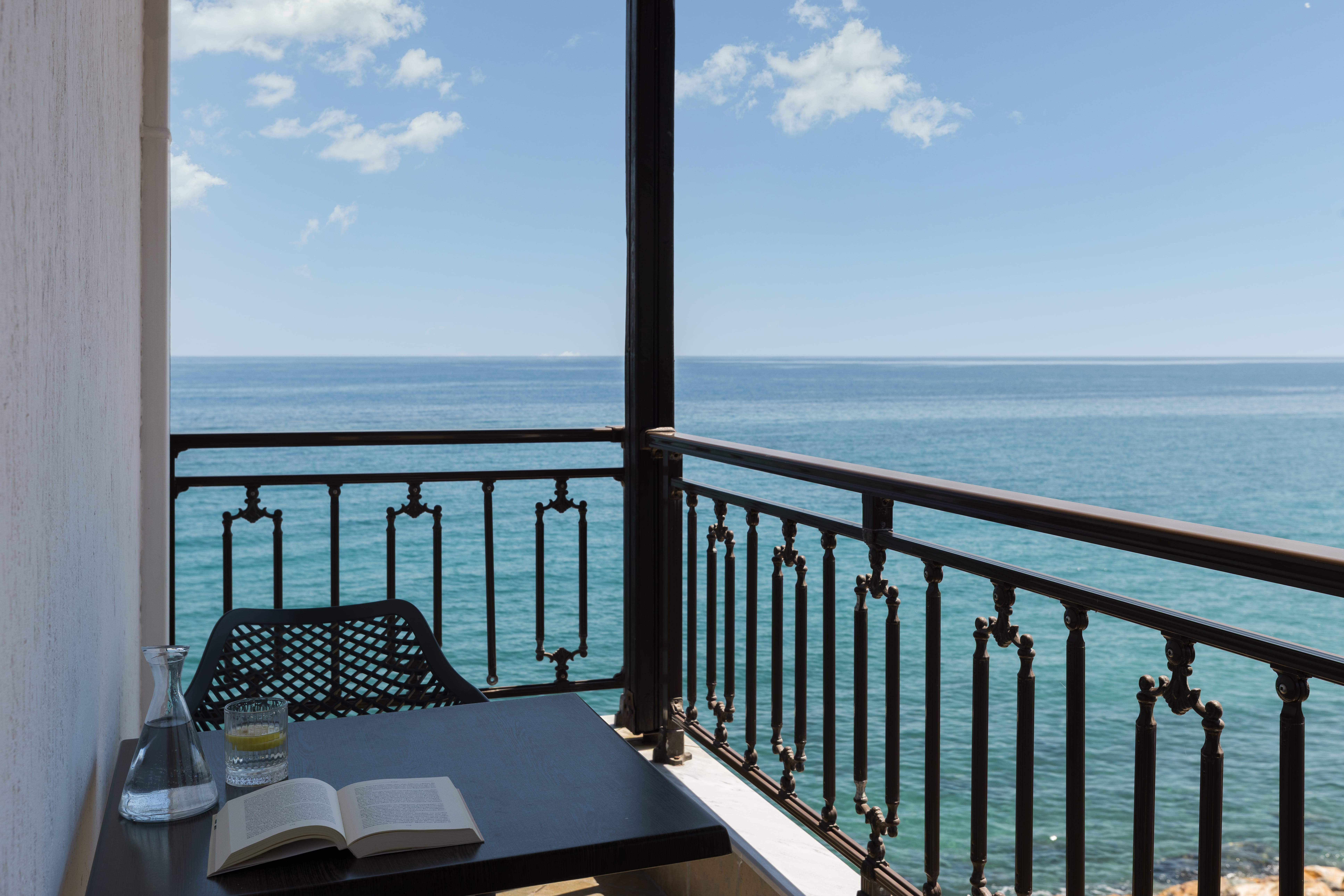 a balcony overlooking the ocean