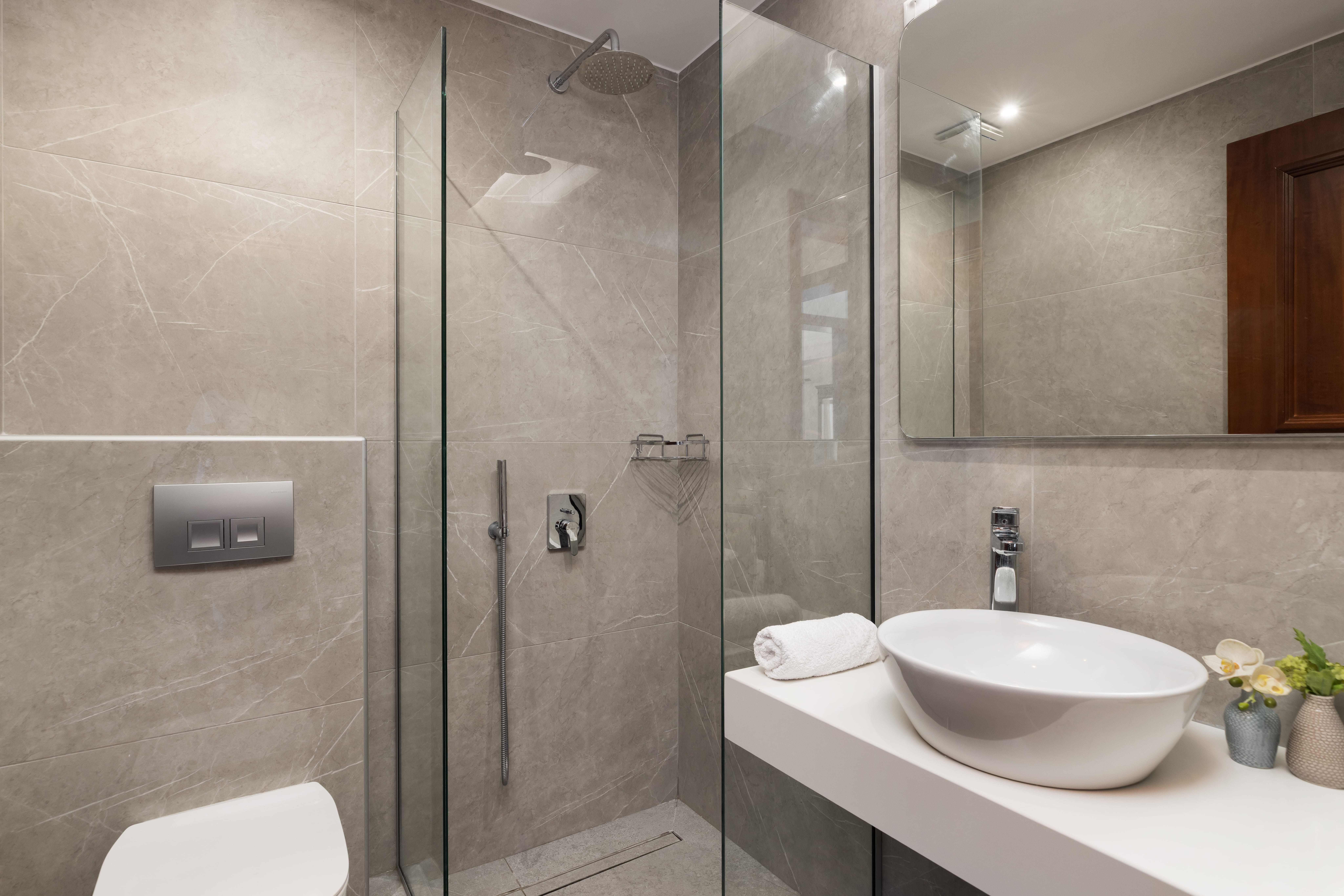 a bathroom with a glass shower