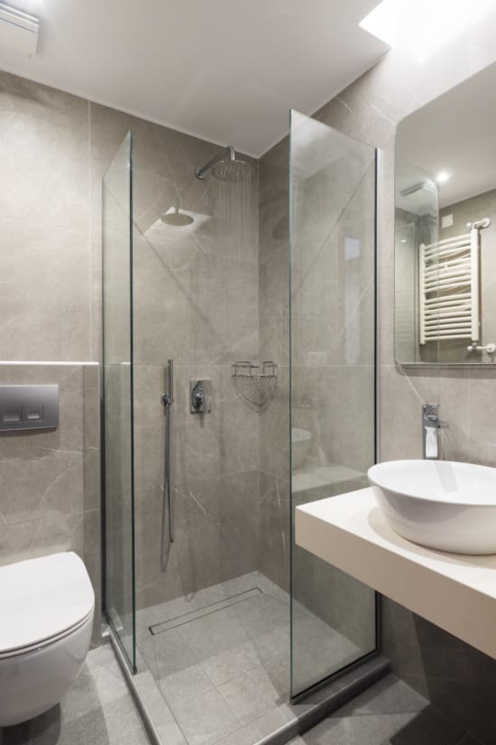 a bathroom with a glass shower