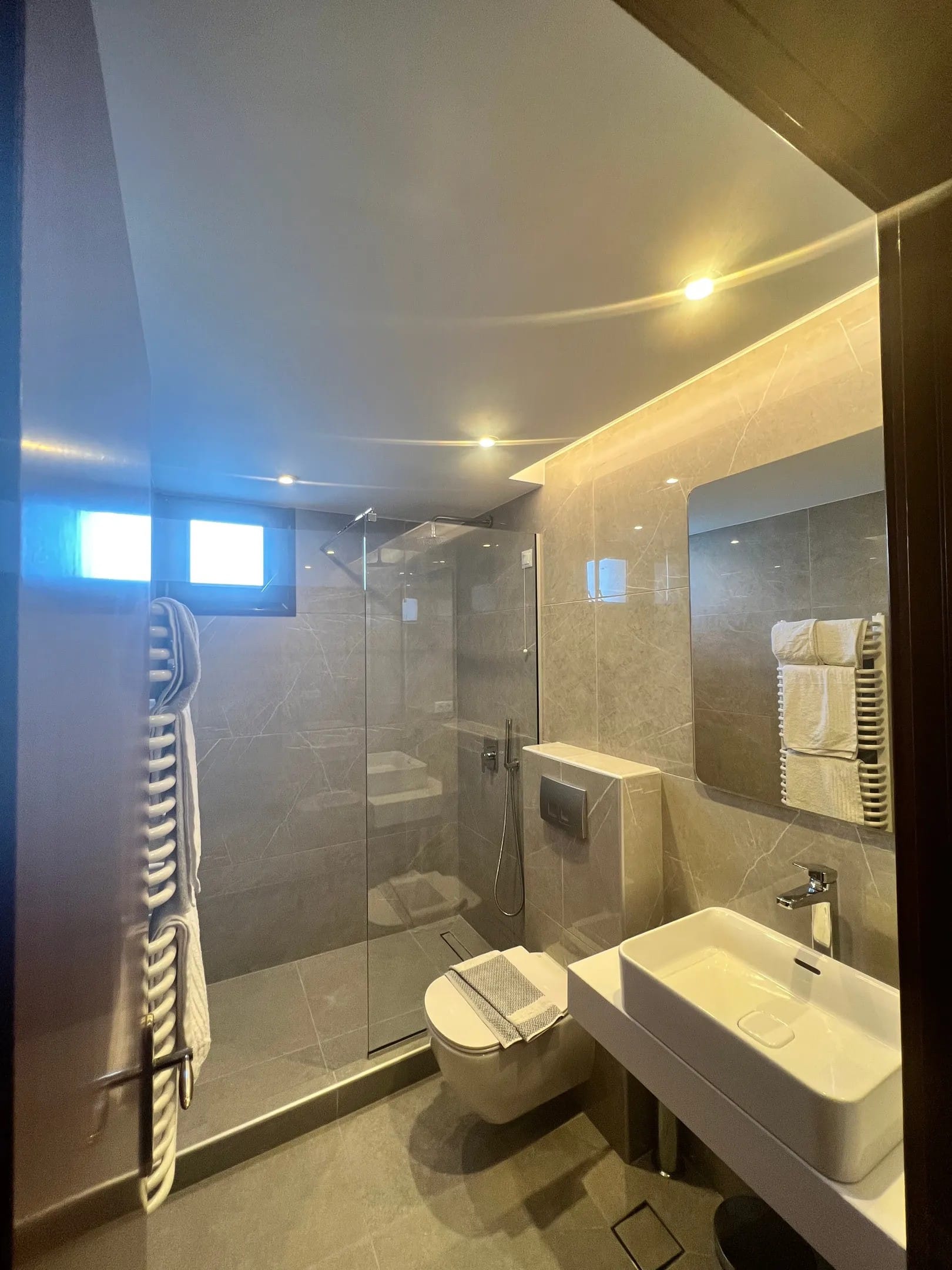 a bathroom with a glass shower