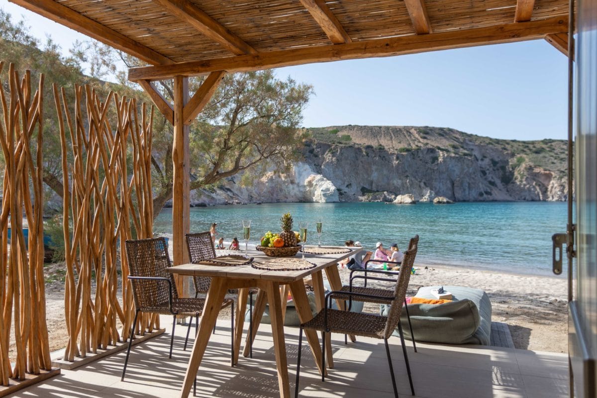 a table and chairs on a deck