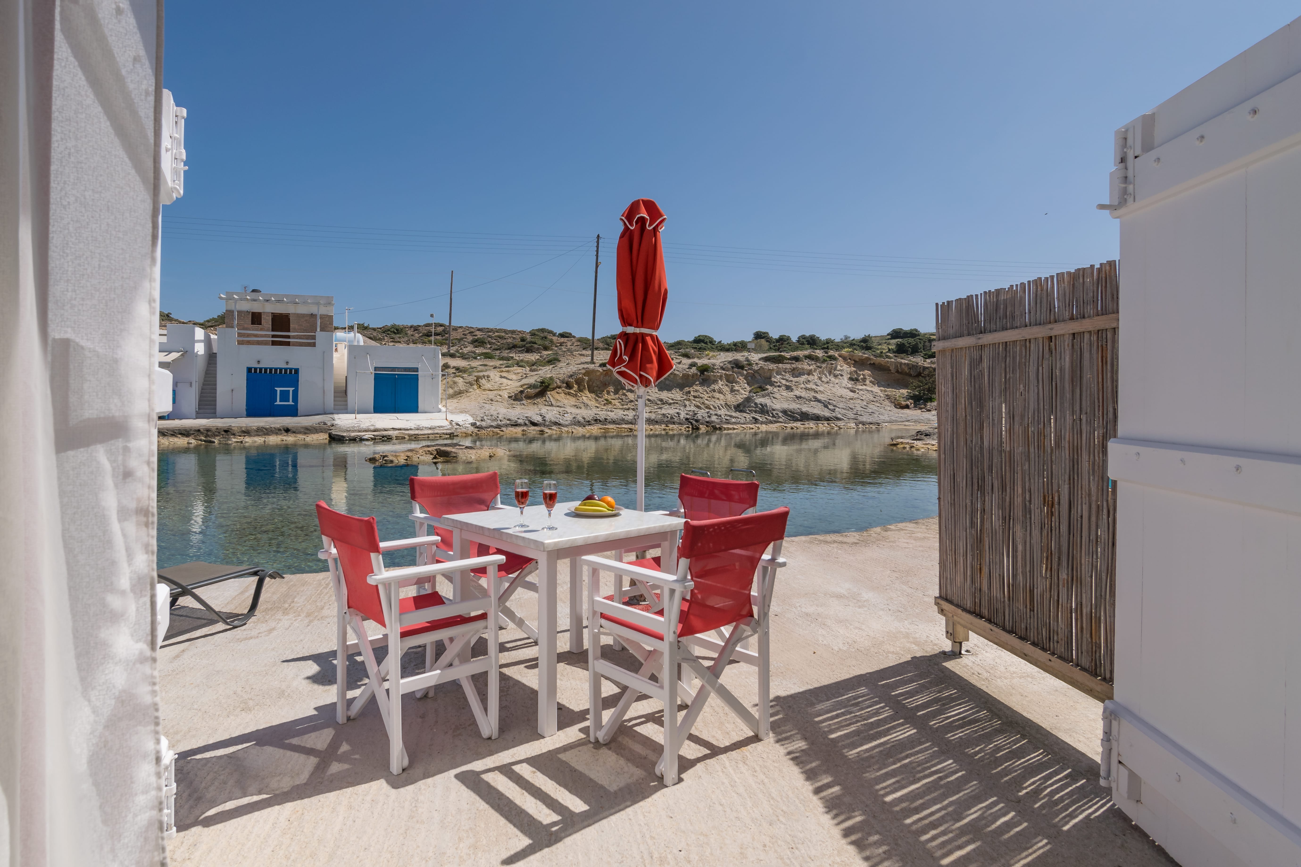 a table and chairs on a deck