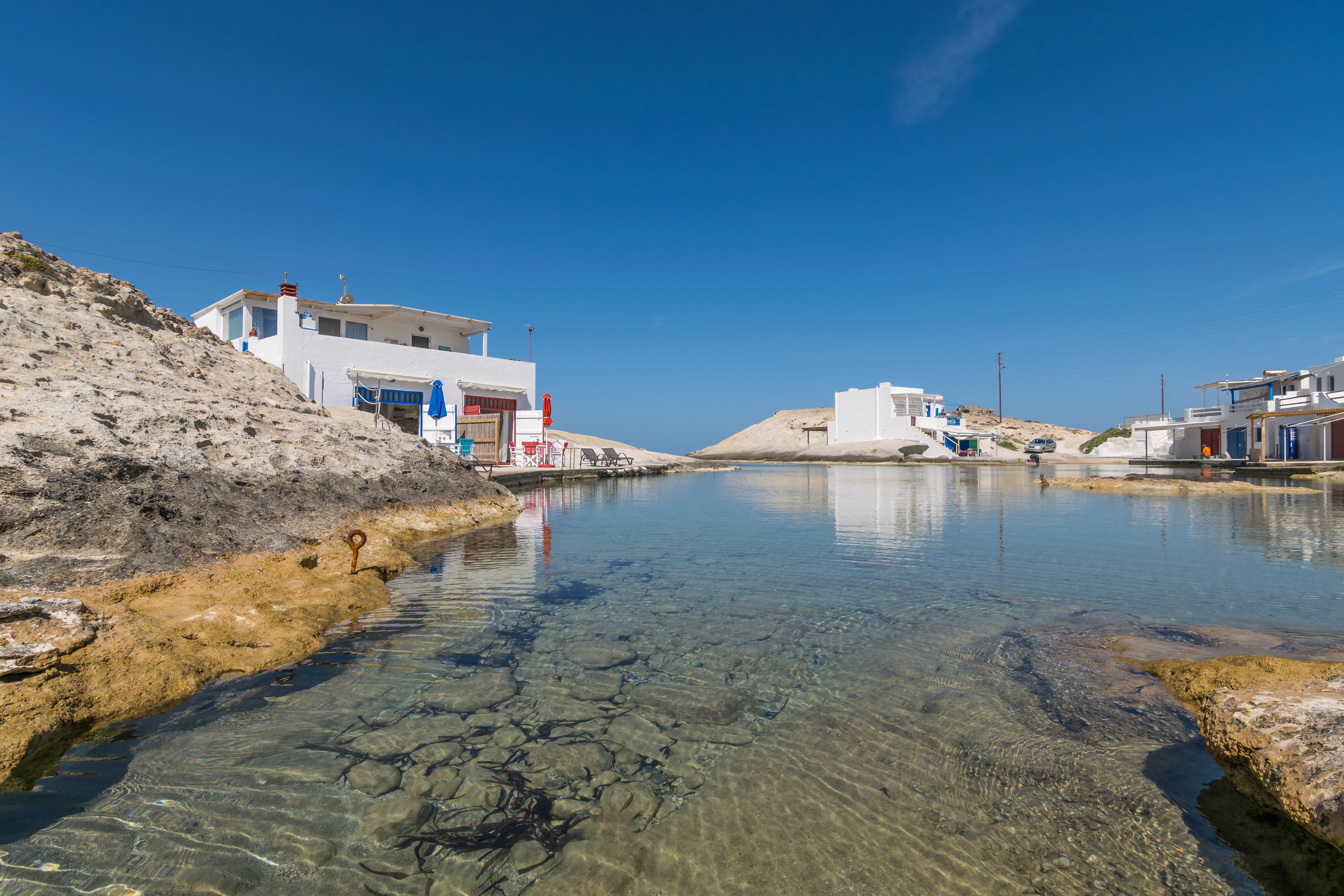 a body of water with buildings along it