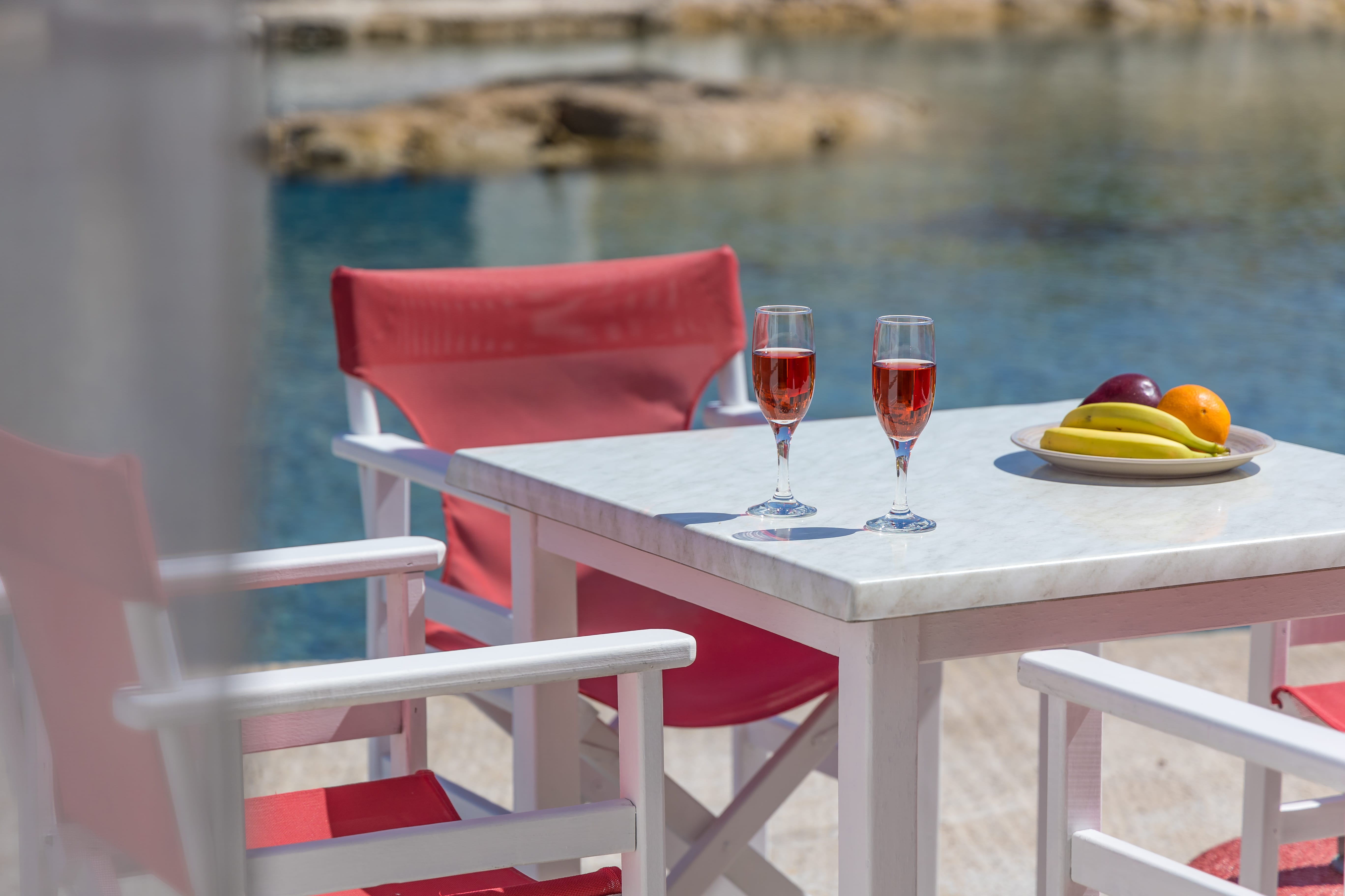 a table with glasses of wine on it
