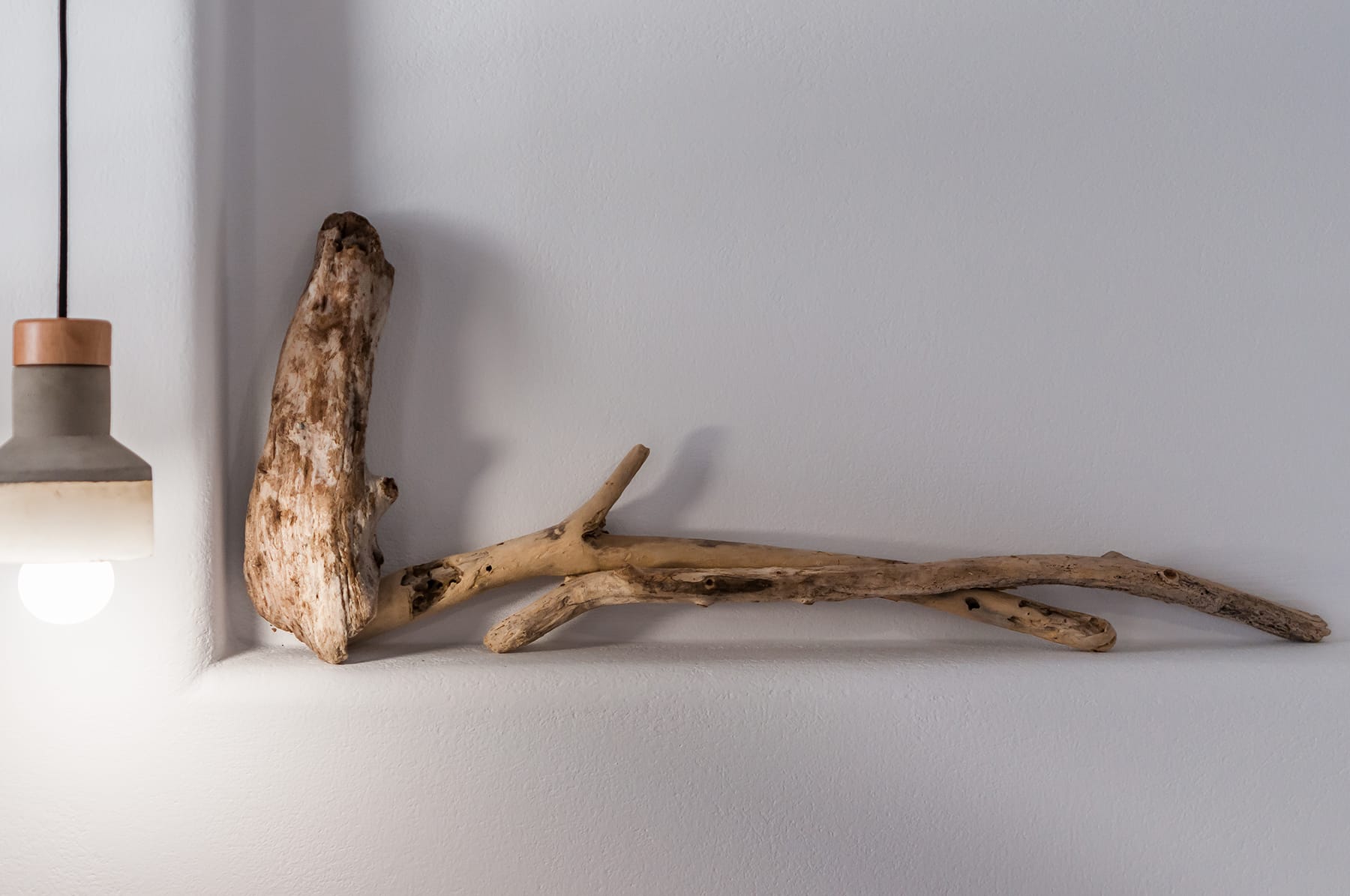 a piece of wood on a white surface