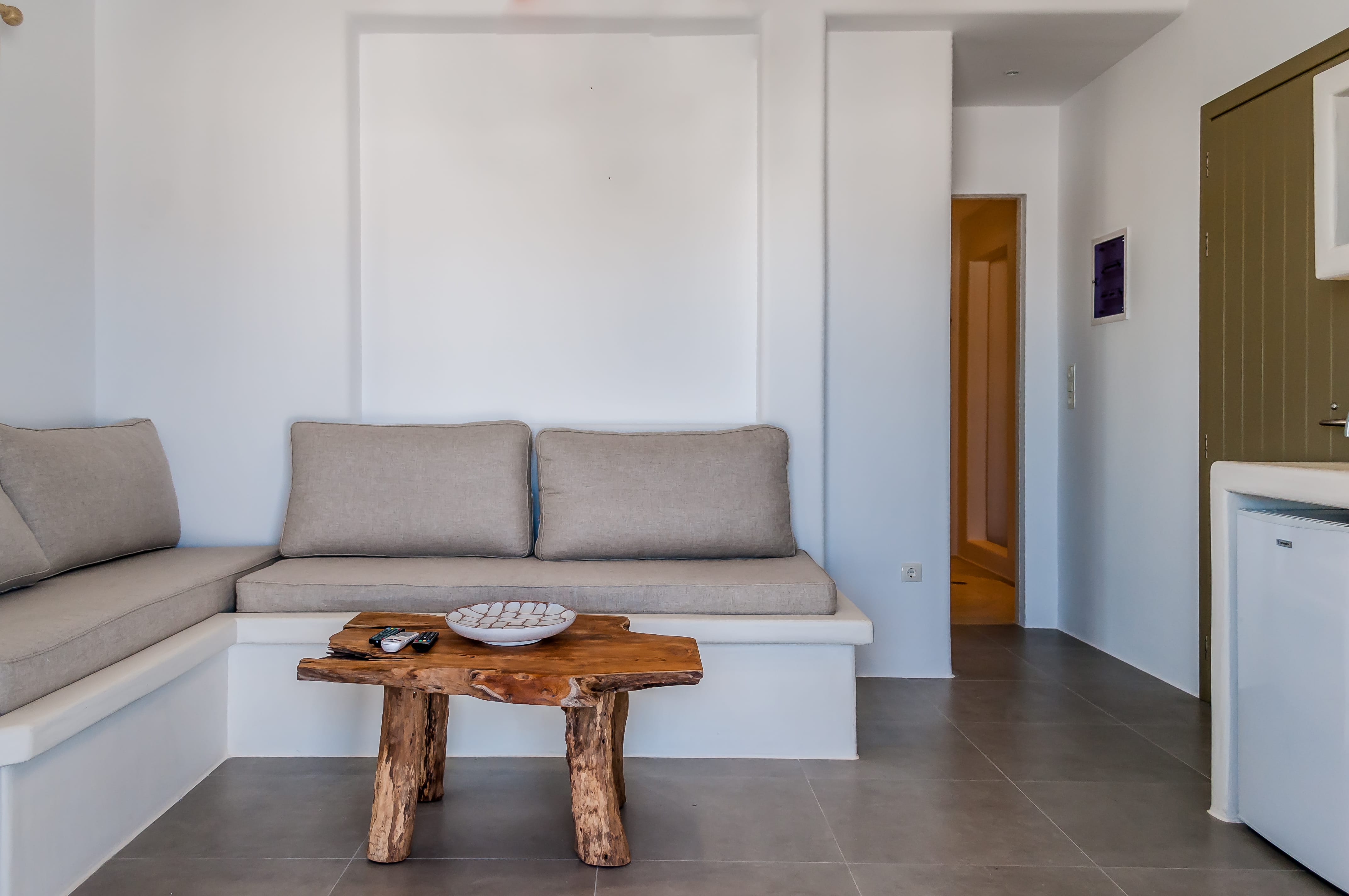 a living room with a couch and coffee table