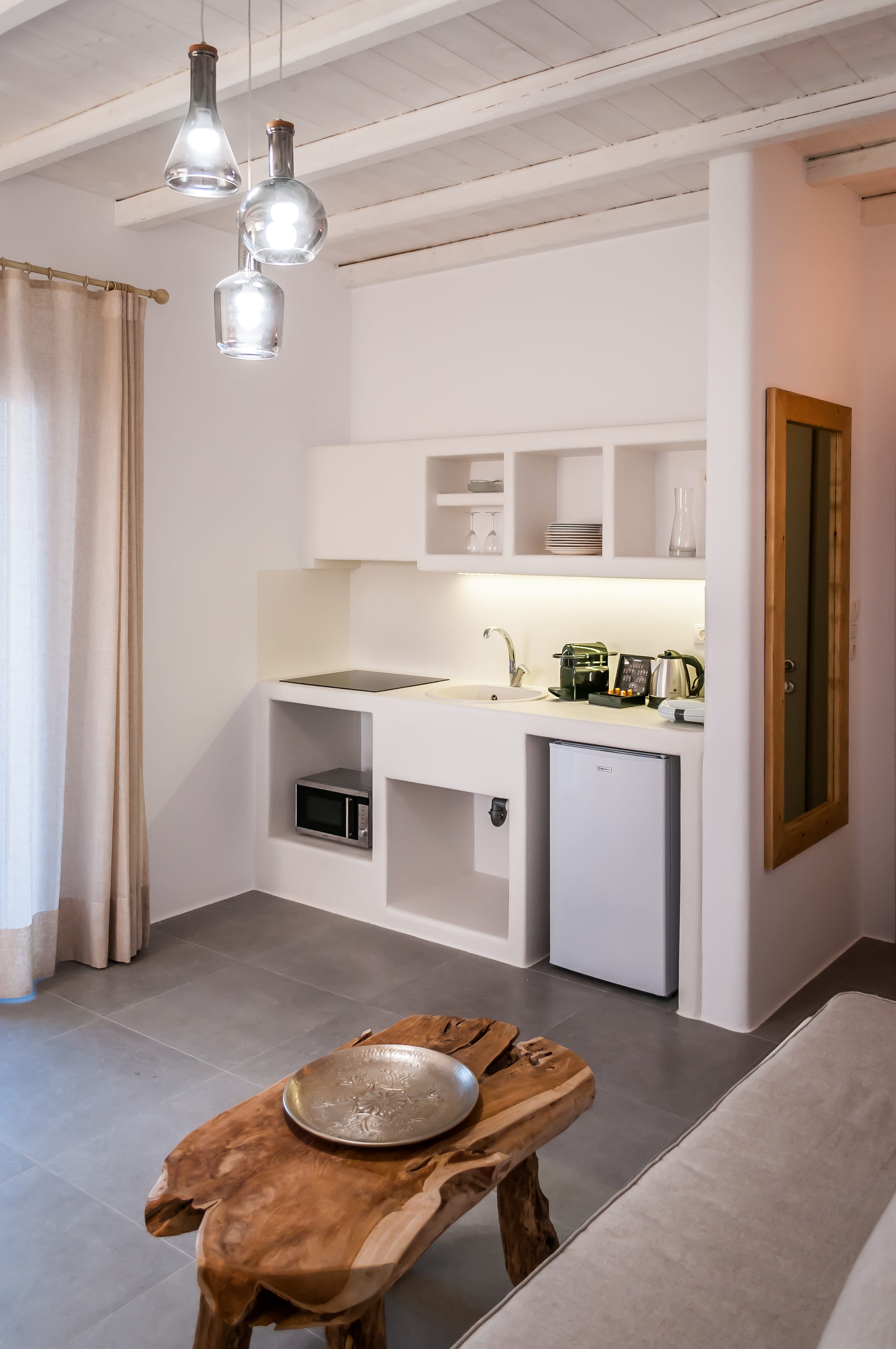 a kitchen with a table and a sink