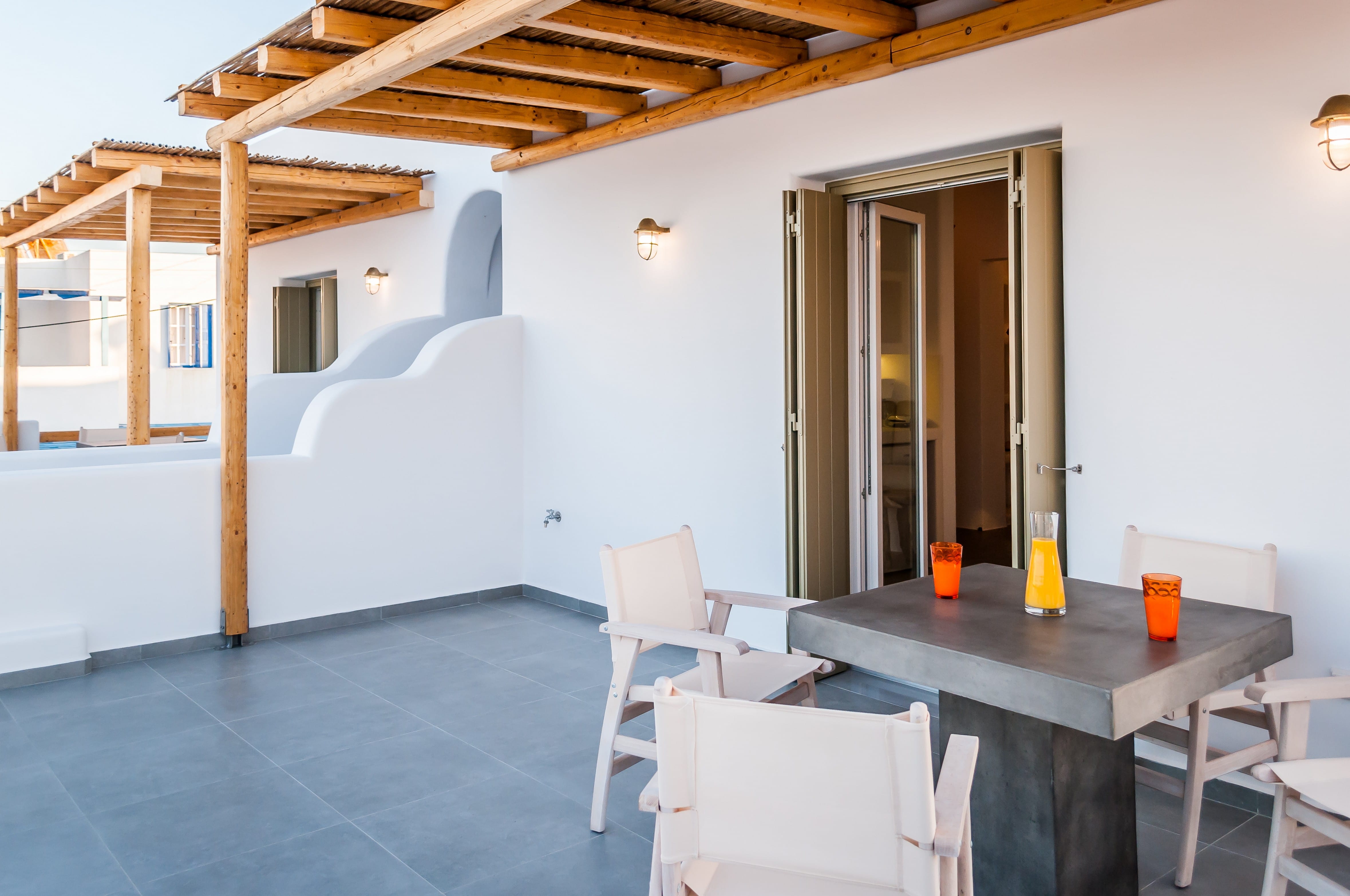 a room with a table and chairs