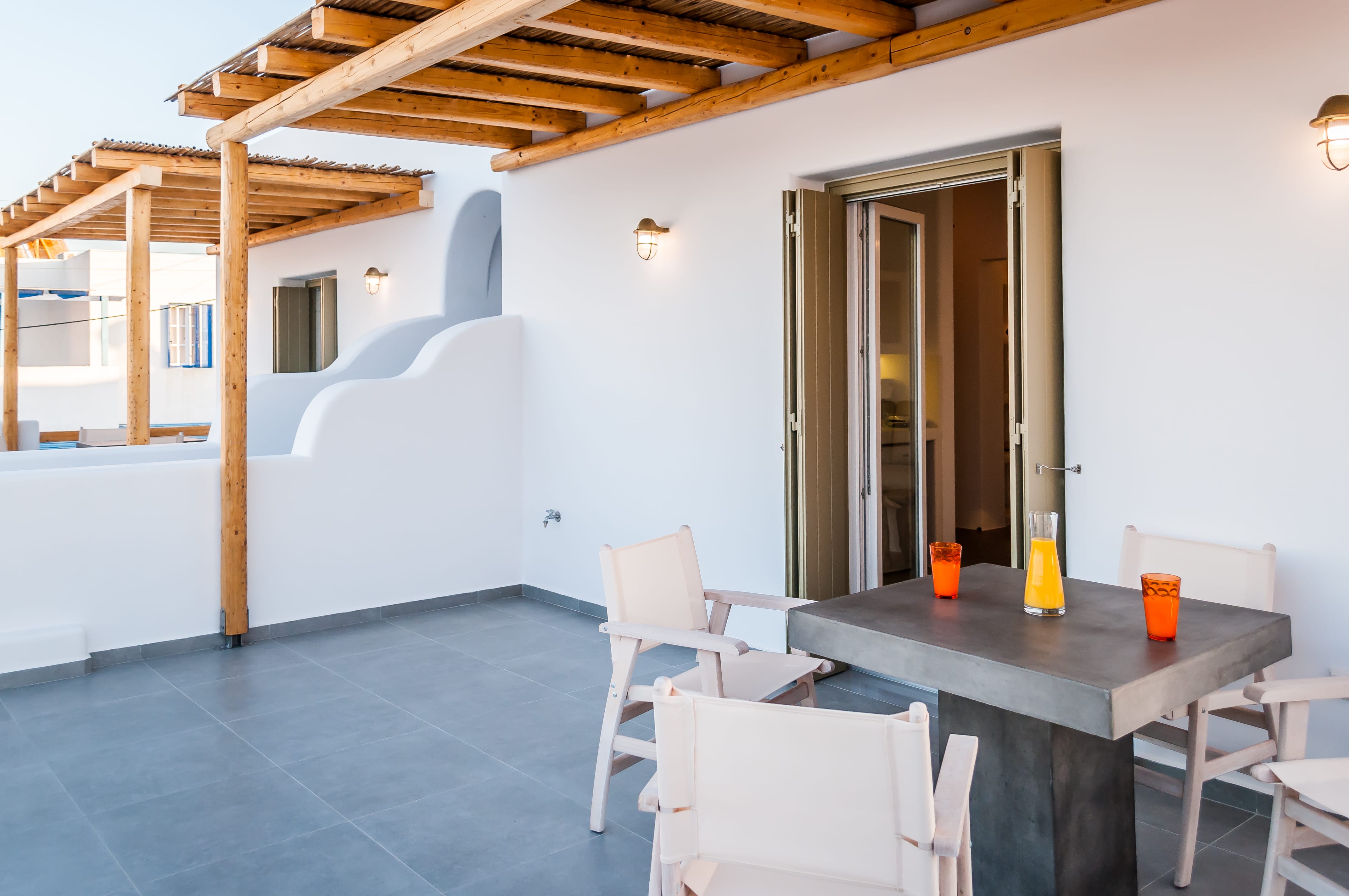 a room with a table and chairs