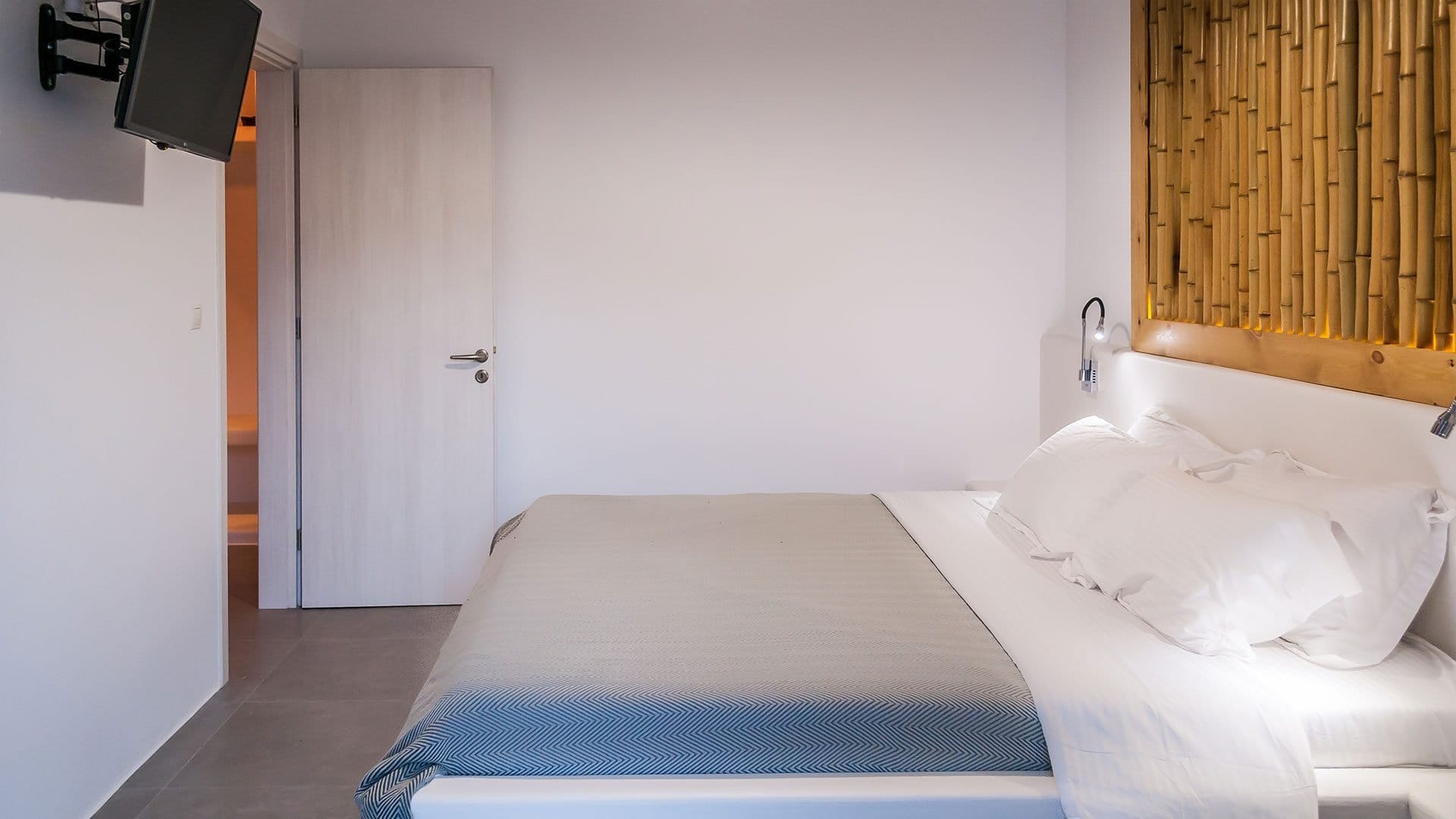 a couple of beds in a room