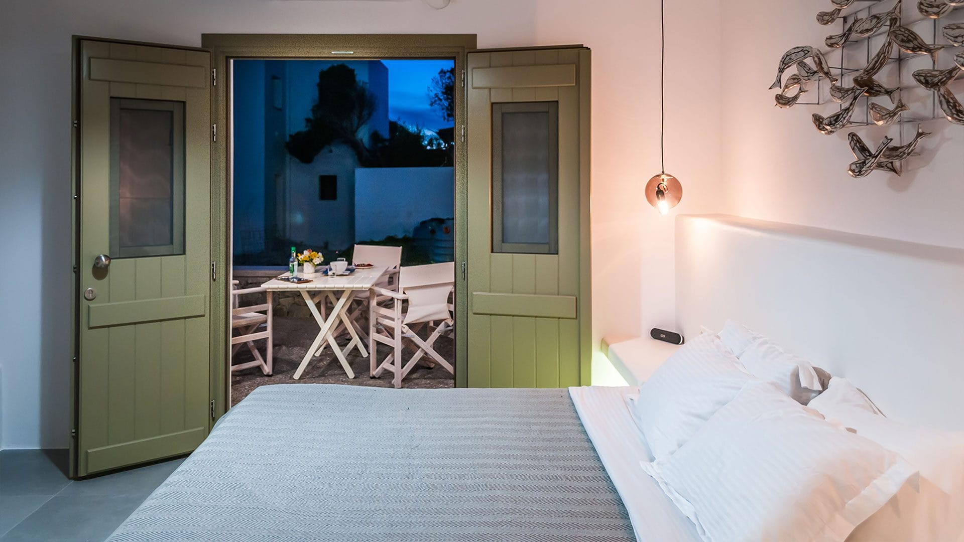 a room with a bed and a table