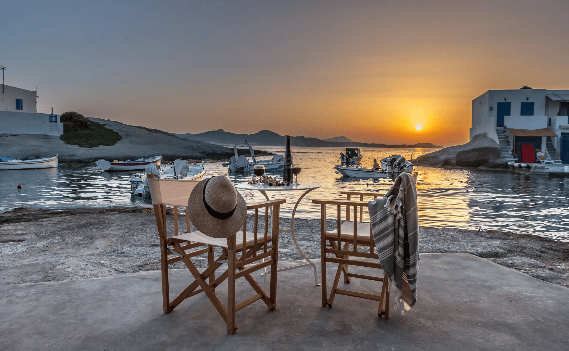 a couple of chairs on a beach