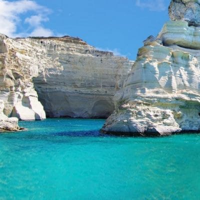 a body of water with large rocks in it