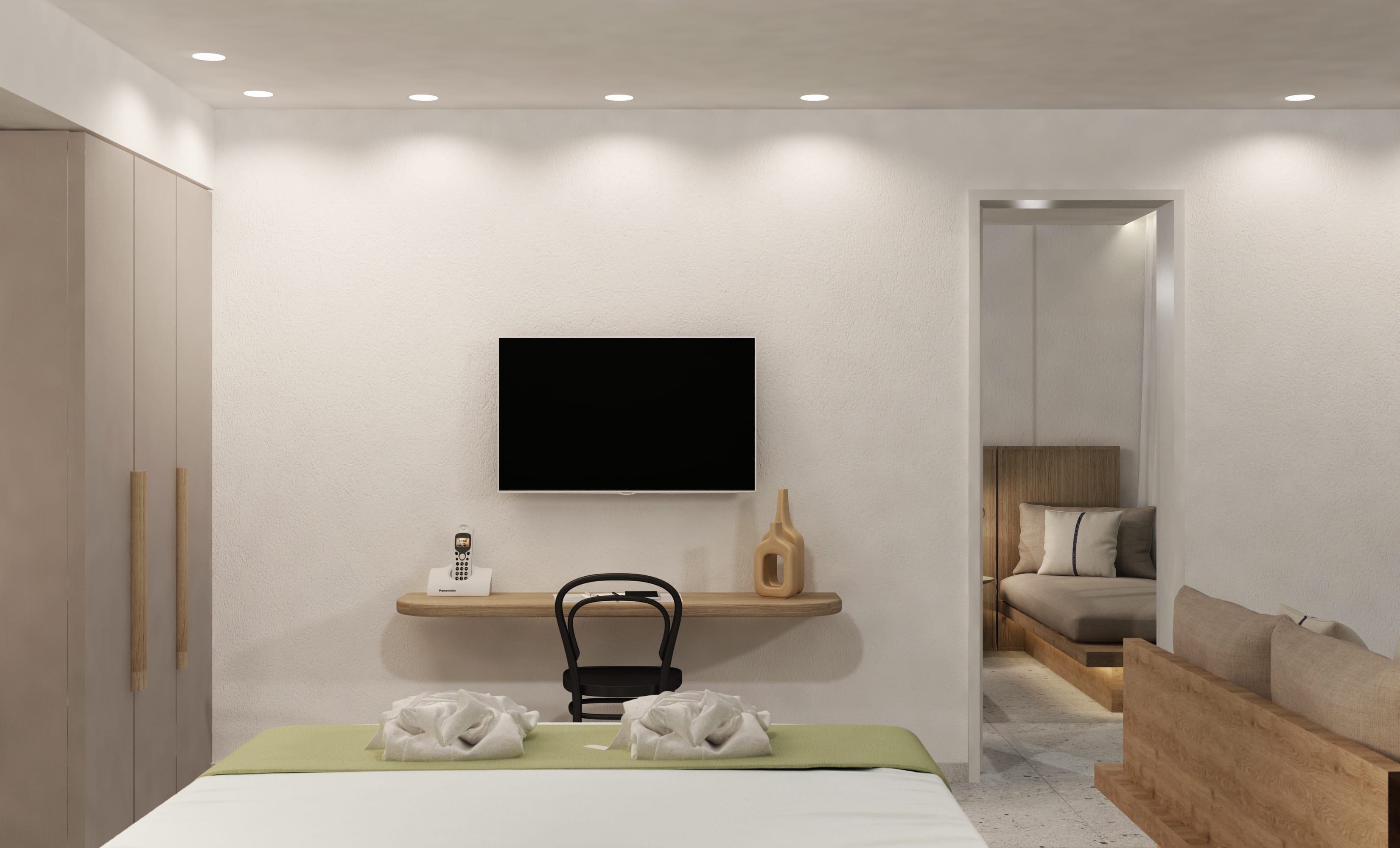 a room with a tv and couches