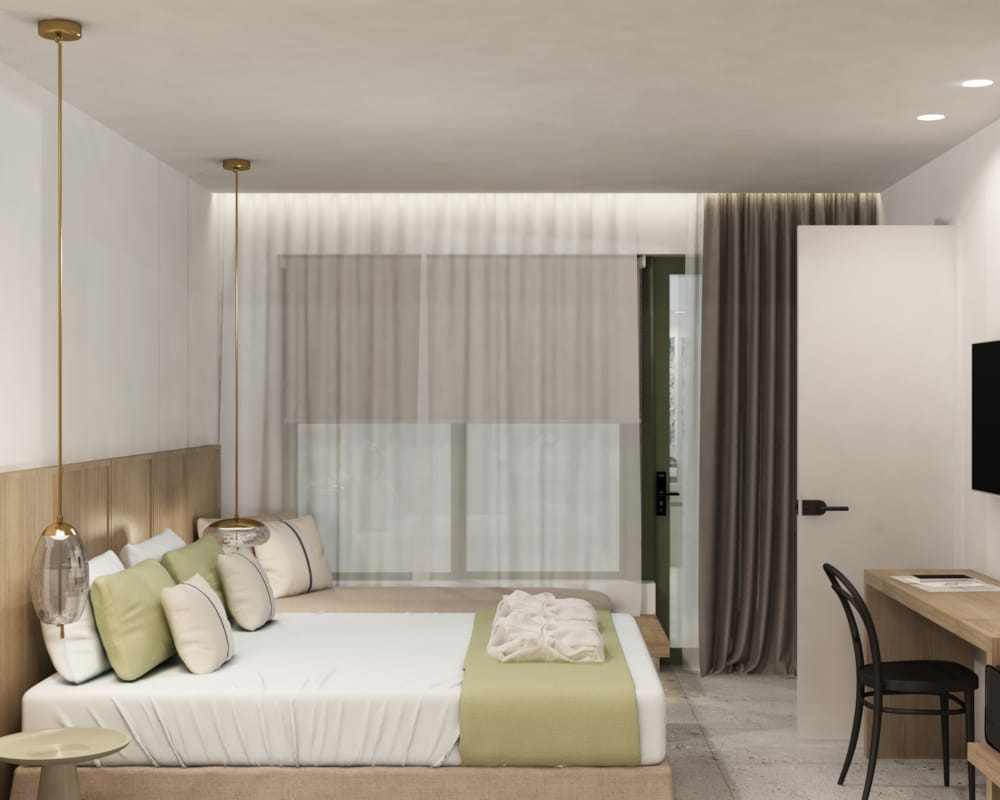 a bedroom with a bed and a tv