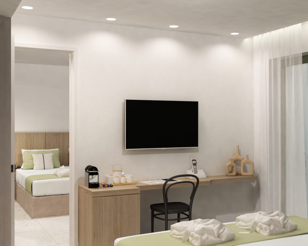 a room with a tv and a bed