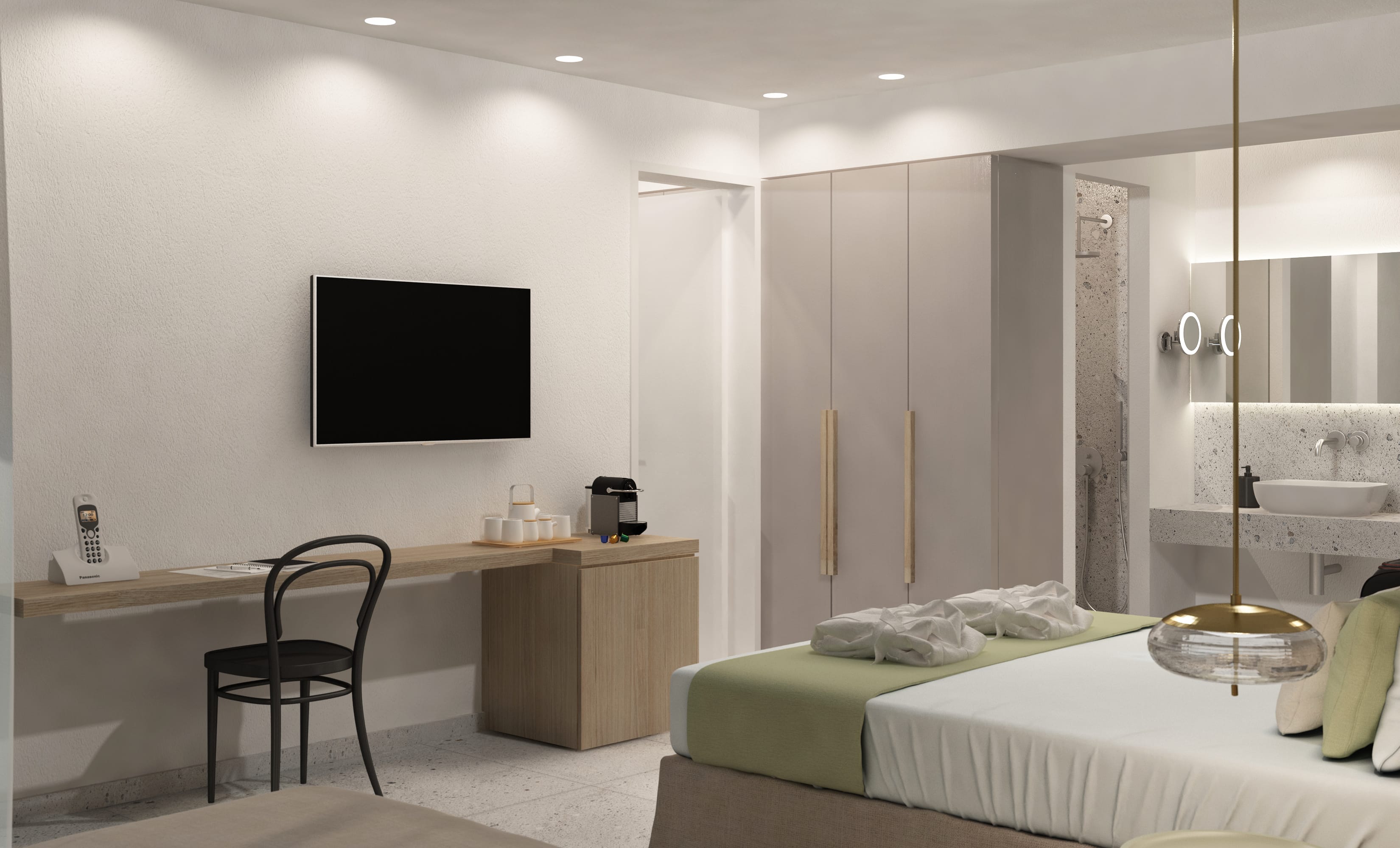 a hotel room with a tv and bed