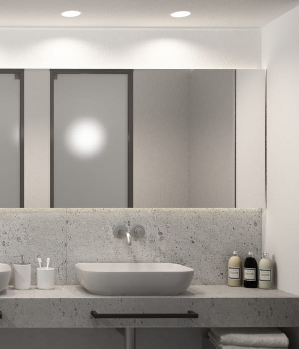 a bathroom with a large mirror